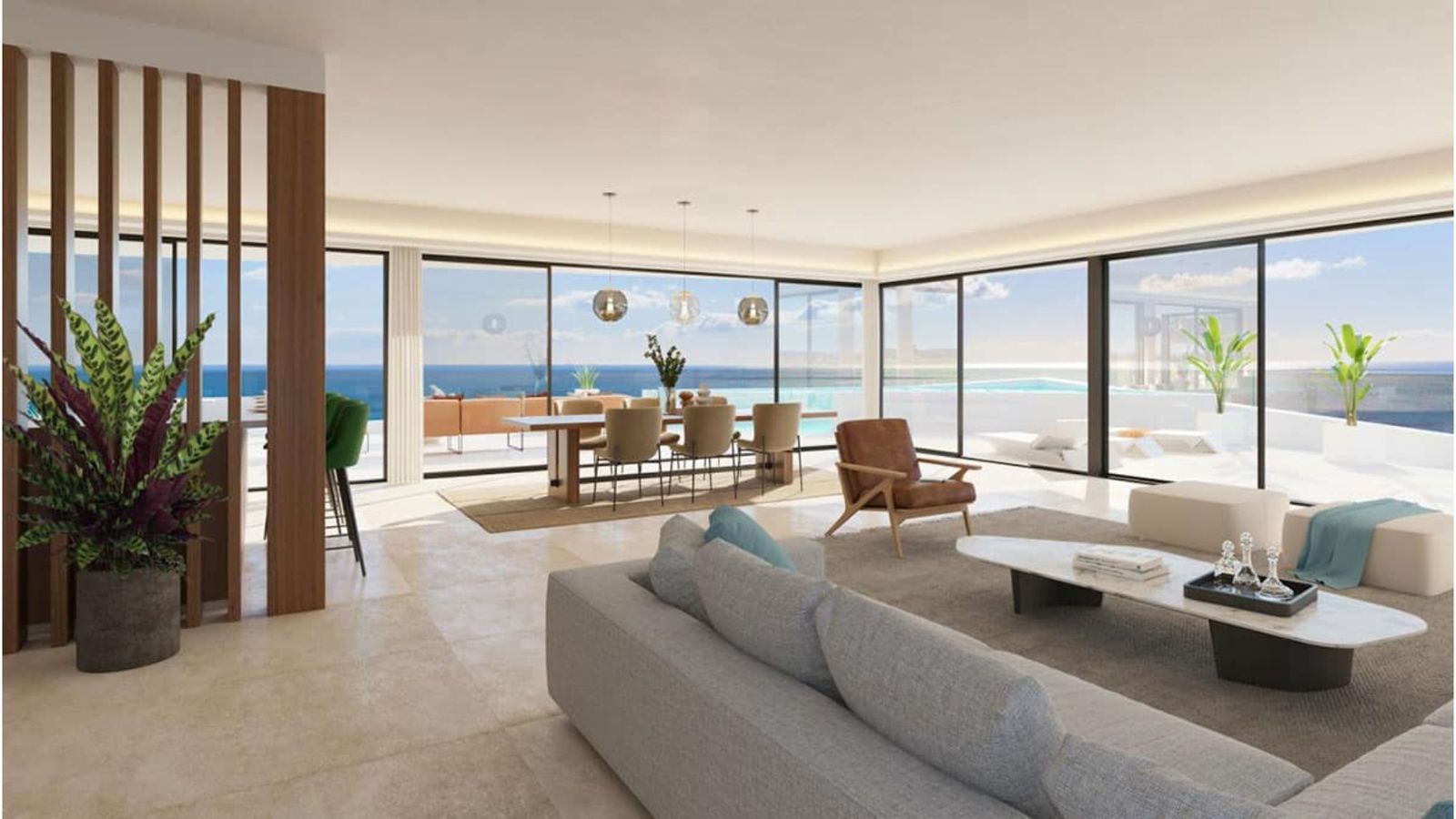 Luxe woonkamer met uitzicht op de oceaan in een modern huis.