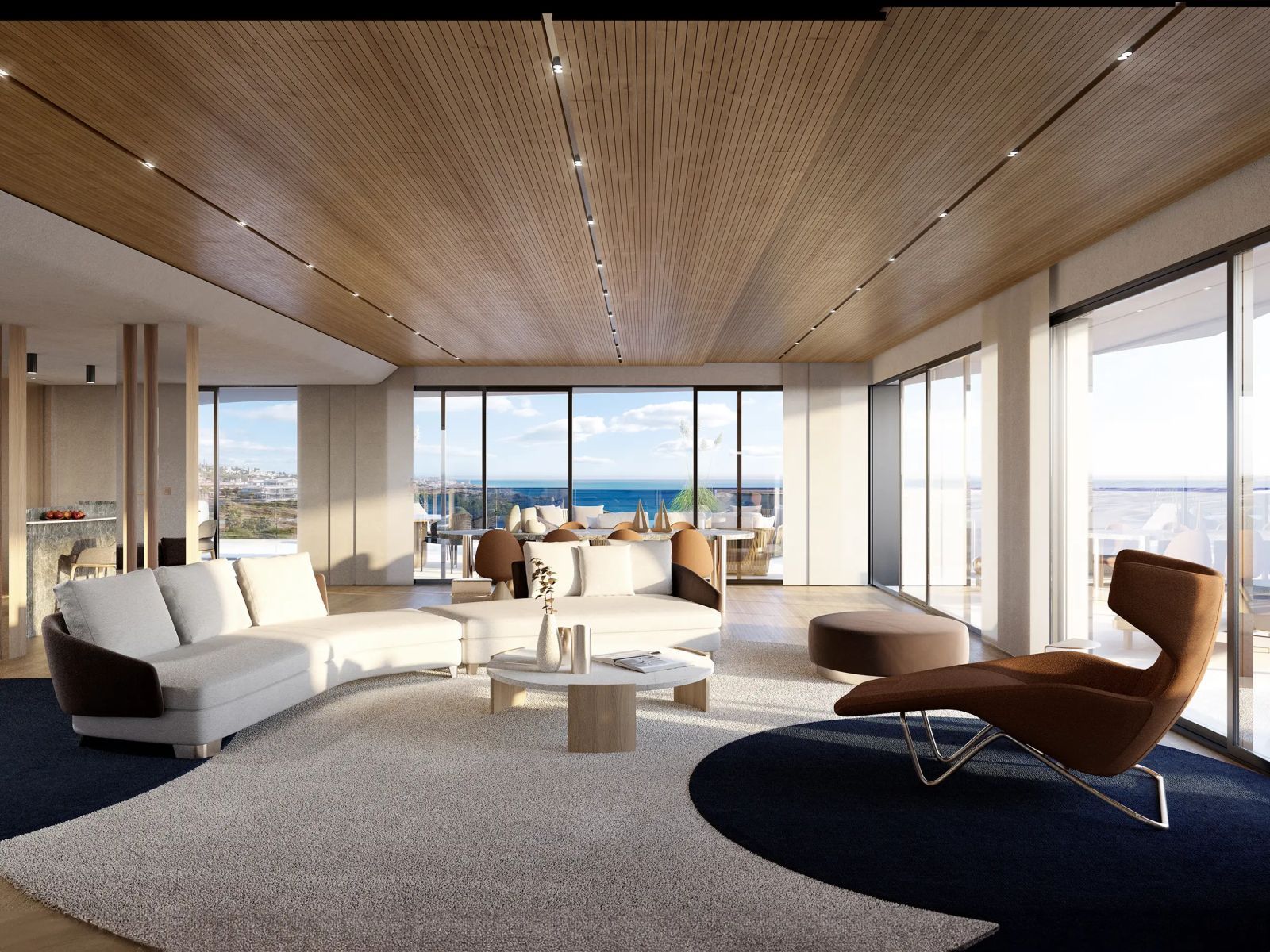 Luxe woonkamer met uitzicht op de oceaan.